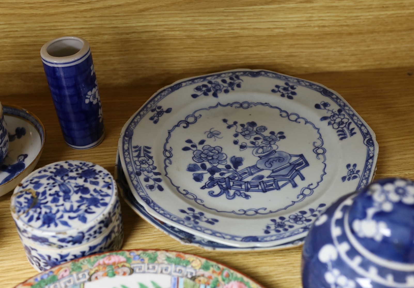 A selection of oriental ceramics, to include a Chinese jar, 12cm tall, and cover, a circular pot and cover, three plates and four other items